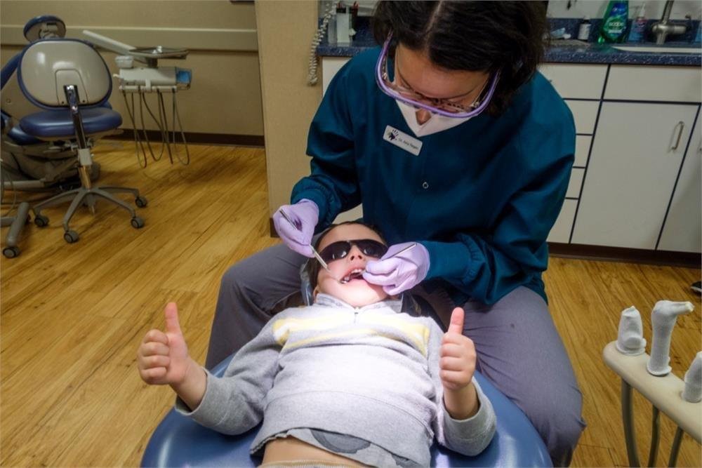 Doctor during kid treatment
