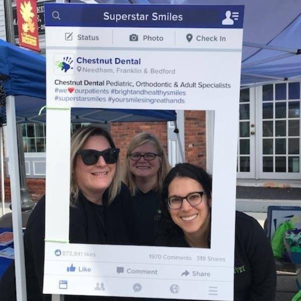 Having fun with props at the Franklin Harvest Festival.