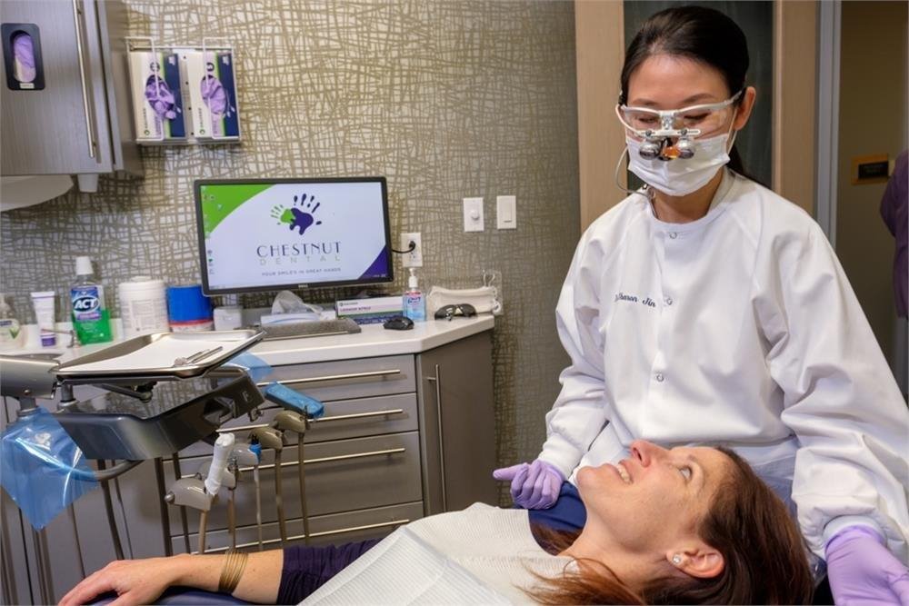 dentist checking her patient
